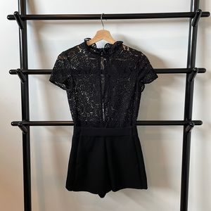 BNWT Maje size 34 black lace jumpsuit